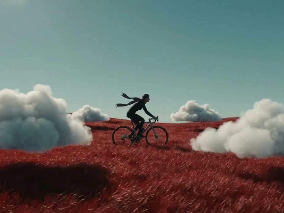 Bike ride across a red dreamscape